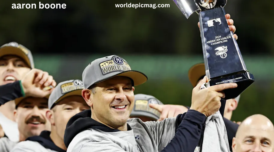 Aaron Boone in Yankees cap, leading team as New York Yankees manager in a baseball game.